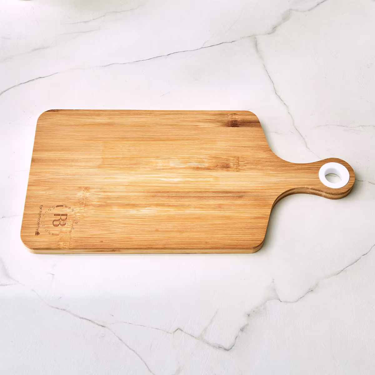 Chef Cubis Edulis Bamboo Chopping Board with Handle in Brown