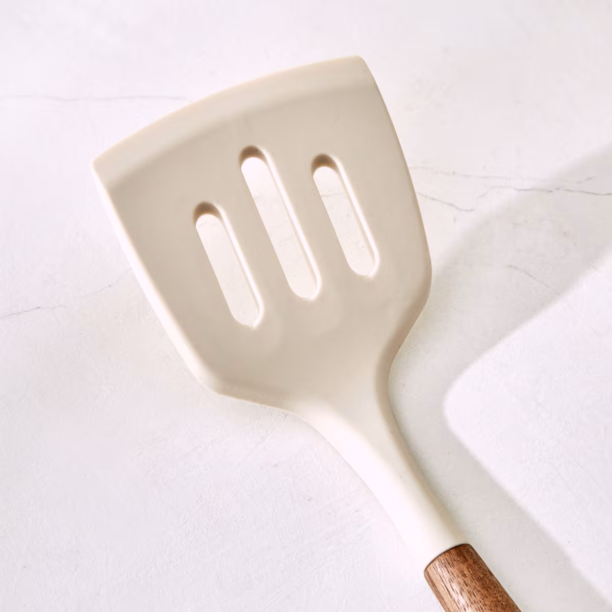 Chefs Pride Zeta Silicone Slotted Turner with Wooden Handle in Cream